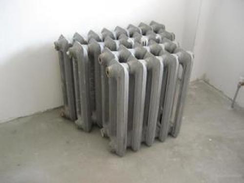 Вес и характеристики чугунных батарей отопления разных типов. Какое значение имеет вес батареи 17