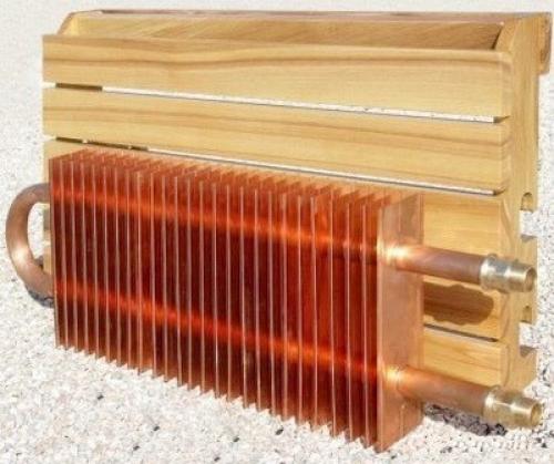 Медный радиатор для отопительной системы дома. В зависимости от устройства, радиаторы отопления из меди можно разделить на типы: